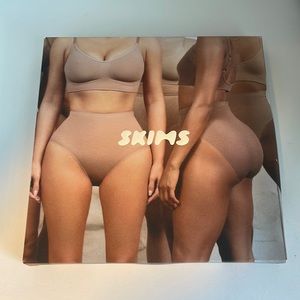 Unopened SKIMS sculpting seamless high waist thong. Size L/XL. Color mica